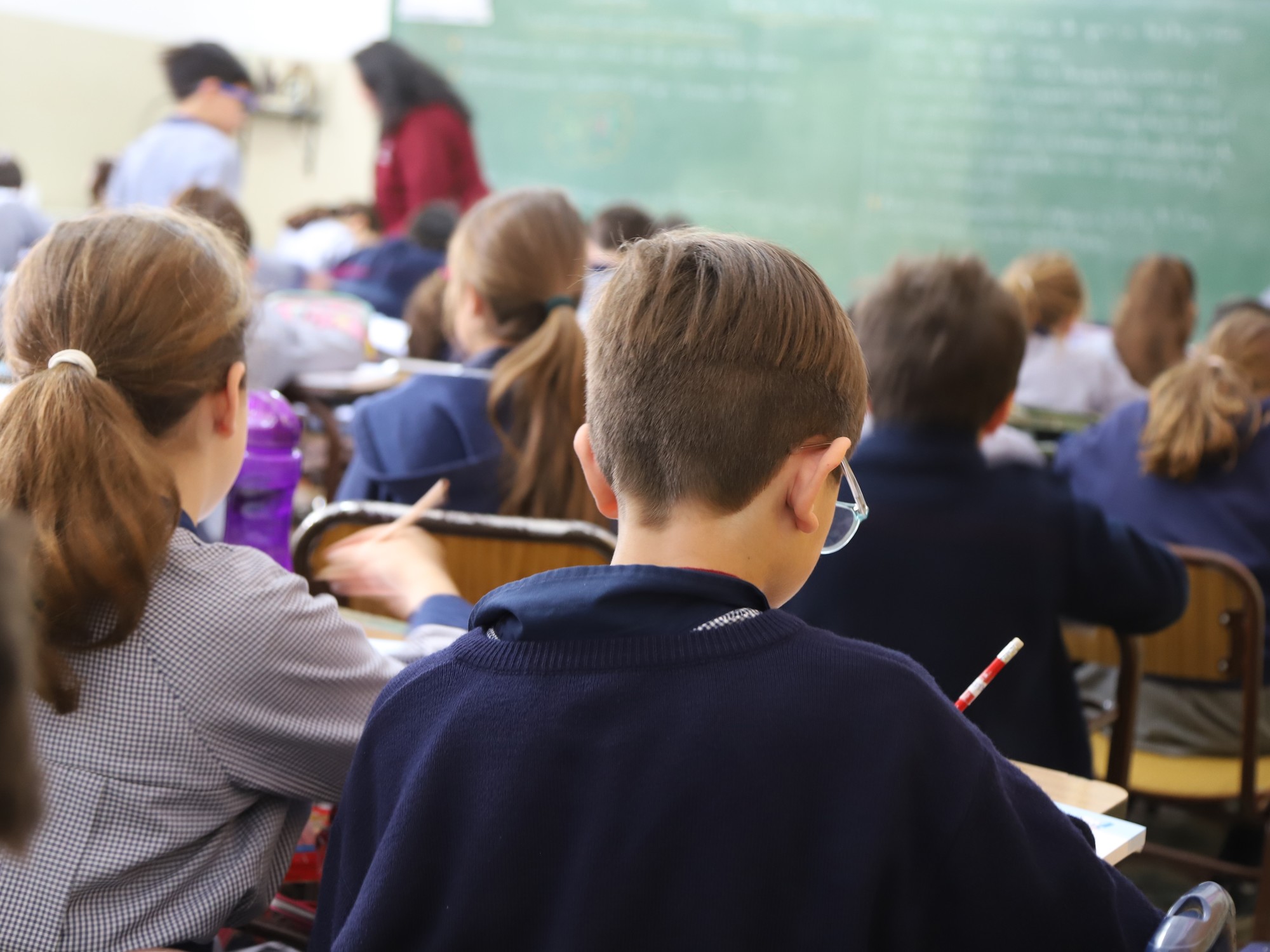 Children,Writing,In,The,Classroom.,Students,In,Class,Copying,Text